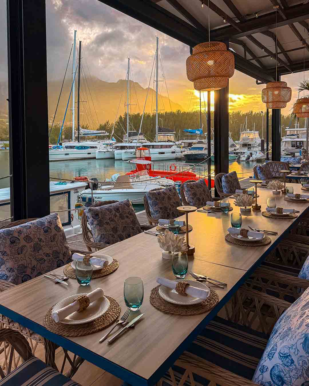 Fish& restaurant overlooking Eden Island Marina at sunset in Seychelles